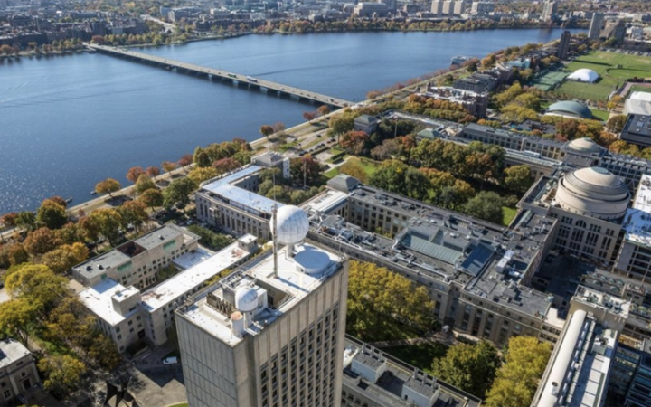 Aerial view of the MIT campus and a bridge crossing the Charles River
