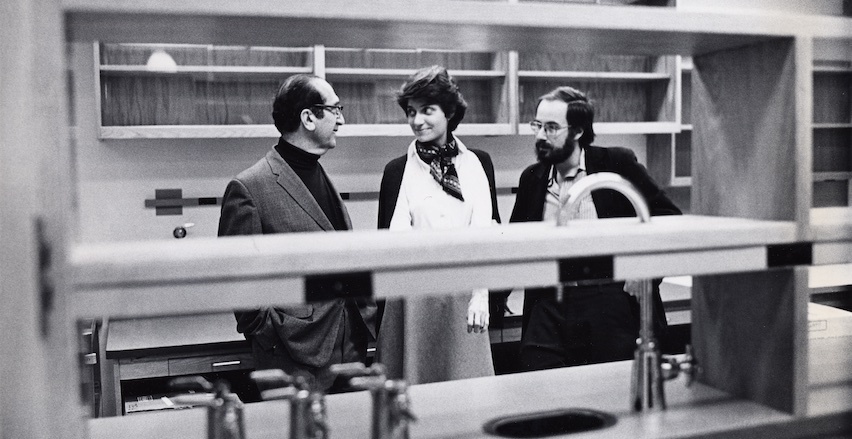 Salvador Luria, Nancy Hopkins, David Baltimore in an MIT Center for Cancer Research laboratory