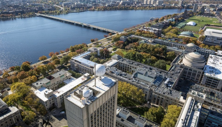 aerial view of bridge connecting MIT campus to Boston