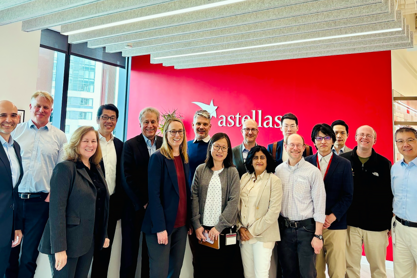 Astrellas and KI researchers stand together in Astrellas Looby