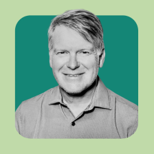 Light green background and in the center is a dark green square featuring a black and white headshot of Darrell Irvine