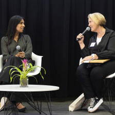 Sangeeta Bhatia and Michal Preminger sit on stage in conversation.