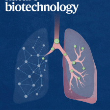 Pink and green illustration of lipid nanoparticles against a blue background - the there is text that says Nature Biotechnology on top and the bottom has text that reads Lung delivery using AI-designed lipid nanoparticles