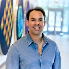 Headshot of Francisco Sanchez-Rivera standing in the Koch Institute Gallery