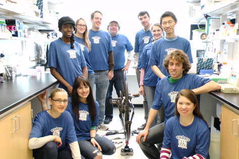Hemann Lab researchers with Go Mitch Go t shirts