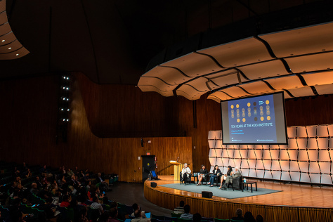 panel talk on stage at MIT Kresge Hall
