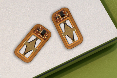Two copper colored cartridges with a diamond shape in the middle