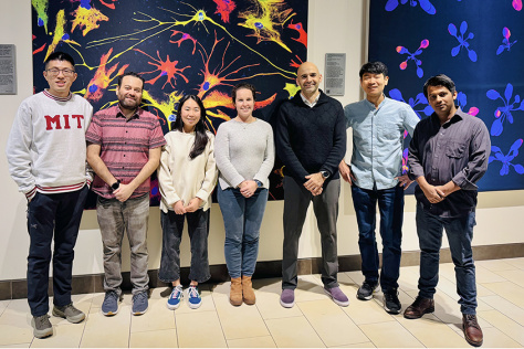 A group of scholars in the Koch Institute Public Galleries