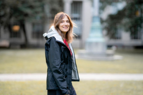 Photo of Regina Barzilay, wearing a black jacket and a scarf