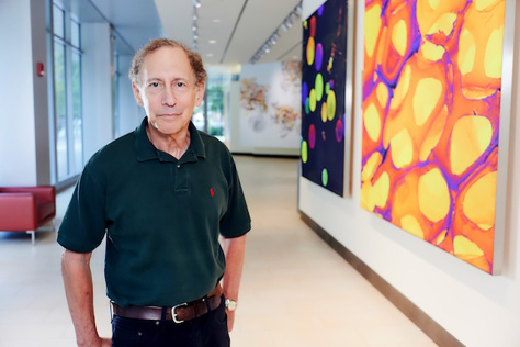 Photo of Robert Langer standing in the Koch Institute Public Galleries