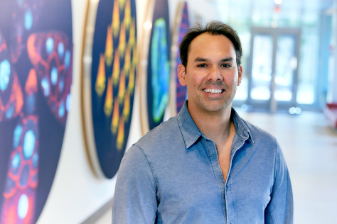 Headshot of Francisco Sanchez-Rivera standing in the Koch Institute Gallery