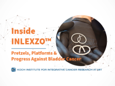 Event title with photo of pretzel shaped device in black gloved hand